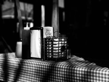 Wine bottles on table at restaurant