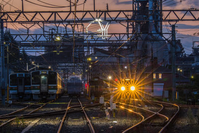 Railroad tracks at night