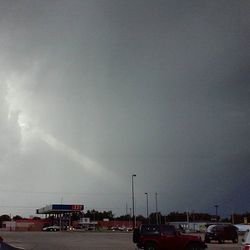 Cars on road against sky