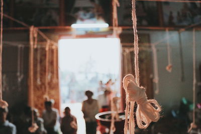 Close-up of people in temple