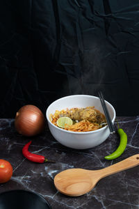 High angle view of fruits in bowl on table