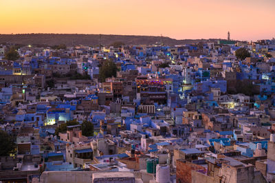 High angle view of townscape against sky at sunset