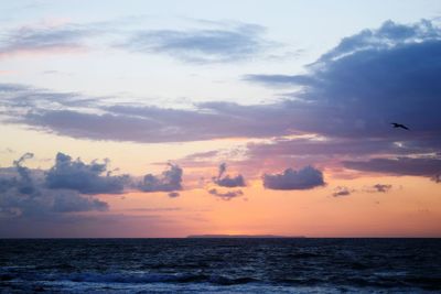 Scenic view of sea at sunset