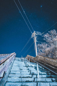 Low angle view of road against sky at night