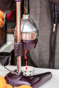 Close-up of juicer on table