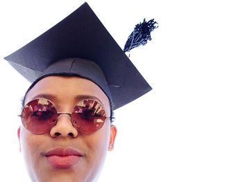 Portrait of young woman over white background