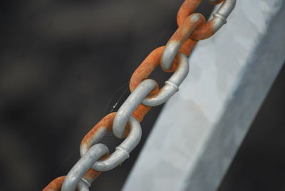 Close-up of rope tied on metal