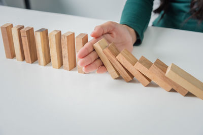 High angle view of child playing on table