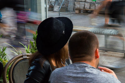 Rear view of people sitting in bus