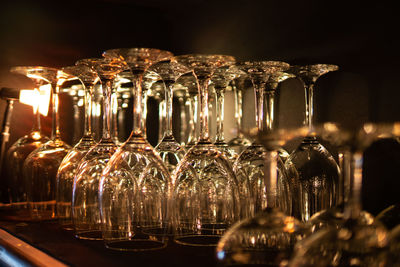 Glass of wine bottles on table