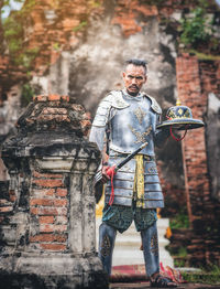 Full length portrait of man standing outdoors