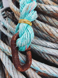 Close-up of rusty metal attached rope