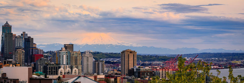 Cityscape against sky during sunset