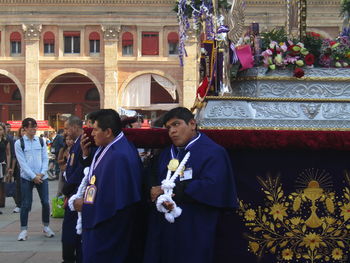 Group of people in temple against building