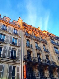Low angle view of building against blue sky