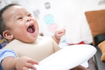 Cute baby boy at home