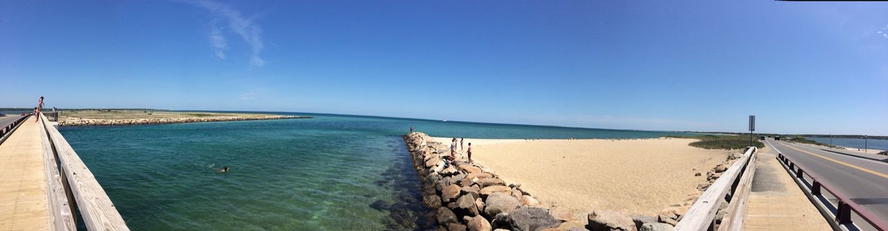 sea, water, horizon over water, blue, tranquility, tranquil scene, scenics, beauty in nature, sky, nature, railing, pier, copy space, clear sky, the way forward, idyllic, panoramic, day, built structure, sunlight