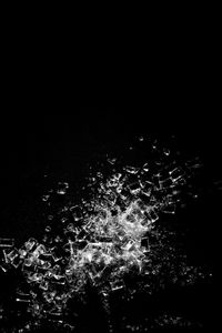 High angle view of illuminated fireworks at night