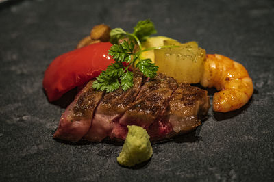 Close-up of food served on table