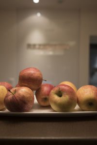 Close-up of apples in container