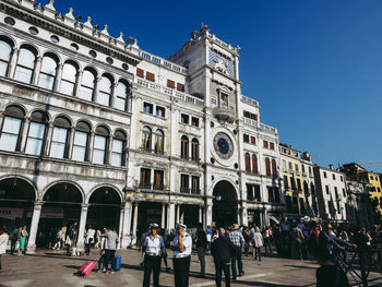 Group of people in front of building