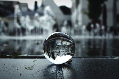 Reflection of cityscape on crystal ball