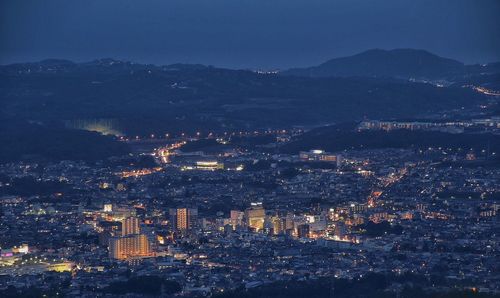 Aerial view of cityscape at night