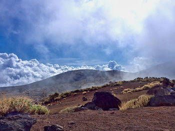 Scenic view of volcanic landscape against sky