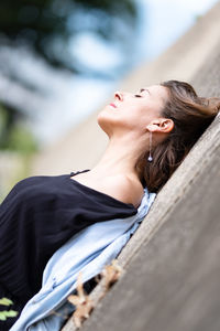 Portrait of woman relaxing outdoors