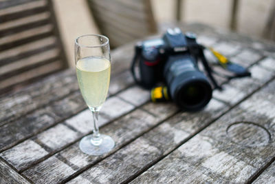 The photographer drinks champagne
