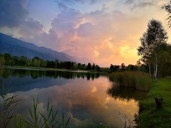 Scenic view of lake against sky during sunset