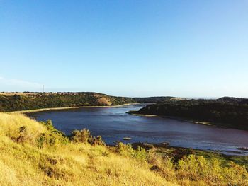 View of river against blue sky