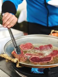 Close-up of person preparing food