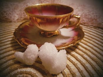 Close-up of tea cup on table