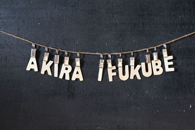 Close-up of text on wall