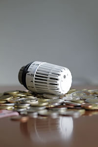 Close-up of vintage car on table against white background