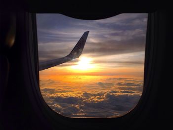 Sunset seen through airplane window