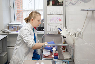 Portrait of female doctor working in laboratory