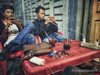 Young man sitting in a bus