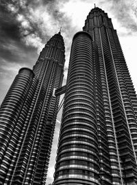 Low angle view of skyscrapers against sky