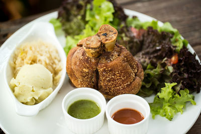 Close-up of food served on table