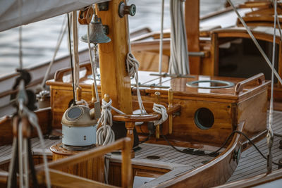 Close-up of sailboats sailing in sea