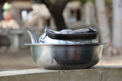 Close-up of cocktail in container on table