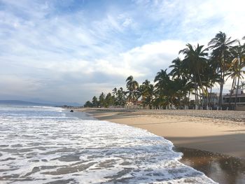 Scenic view of sea against sky on a cloudy day.