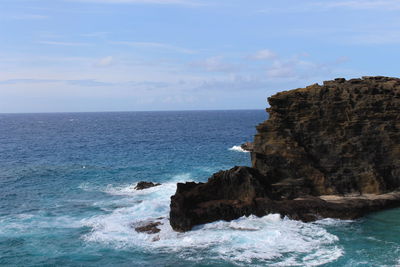 Scenic view of sea and rock formation