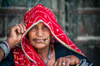 Close-up of woman wearing red hat