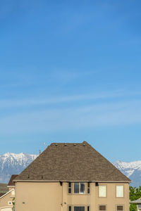 House against sky during winter