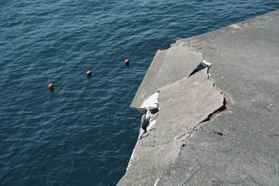 High angle view of boats on sea shore