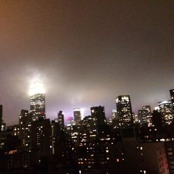 Illuminated cityscape at night