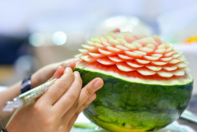 Close-up of hand holding fruit